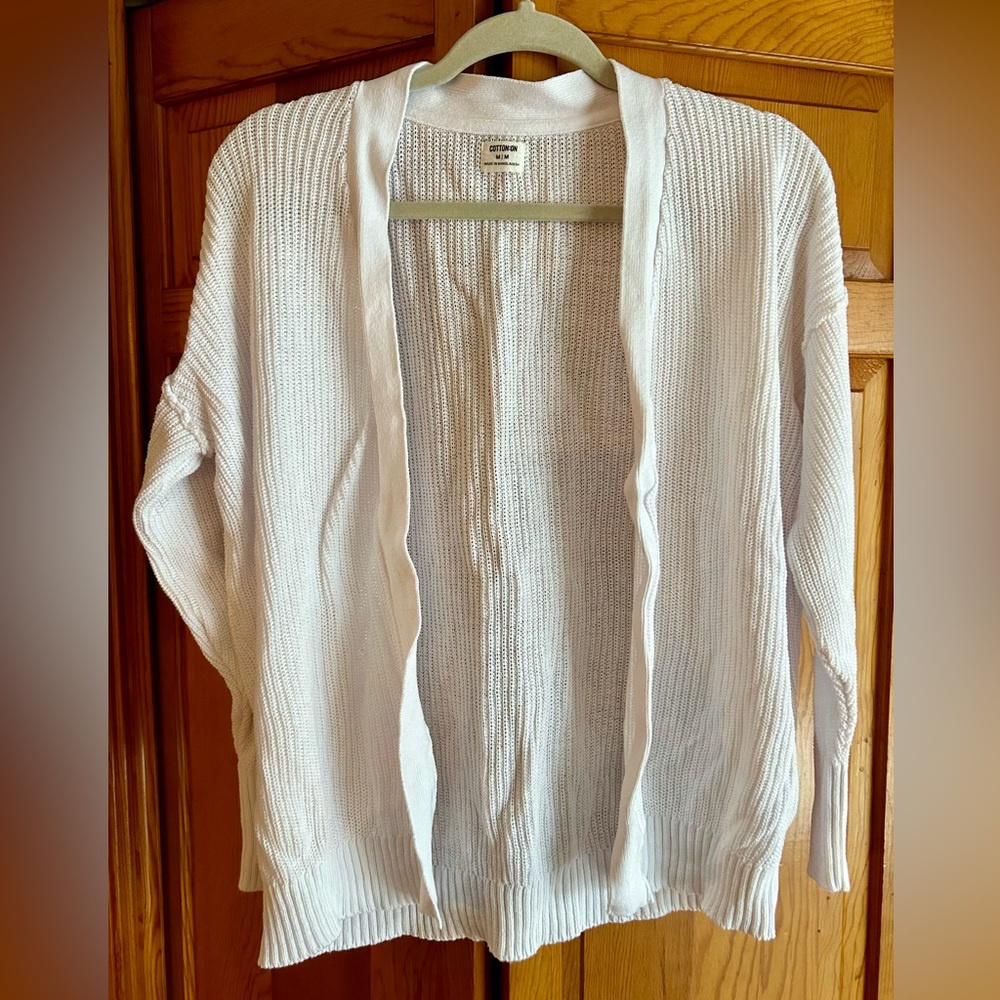 Cotton: on  white sweater medium.